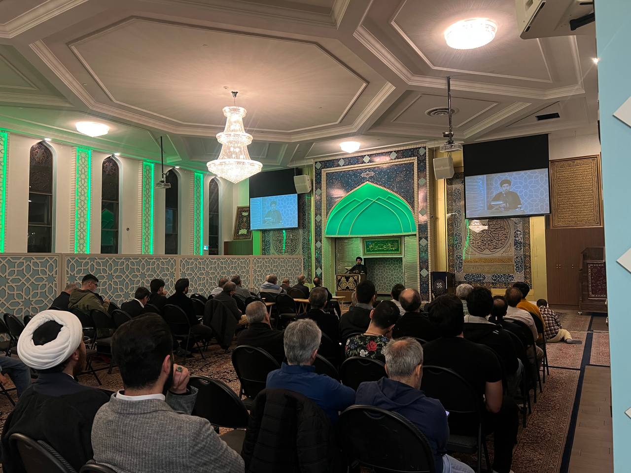 The prayer hall during a program, May 2026
